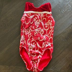 GK Elite leotard. Red with Silver swirls. CS